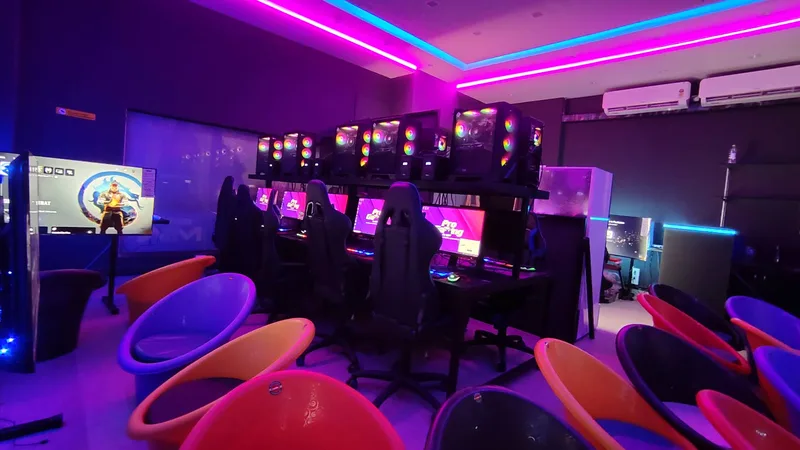 10 Best Gaming Cafes in Pune (2026): Complete Ranked Guide 19 Arena Pro Gaming Camp Pune large esports gaming room with RGB towers and gaming chairs