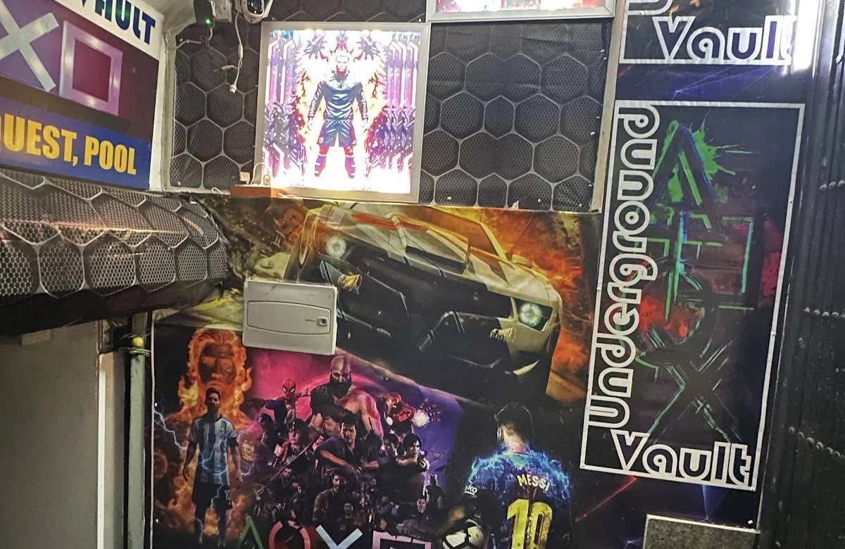 Underground Vault gaming cafe Delhi entrance with game art and signage
