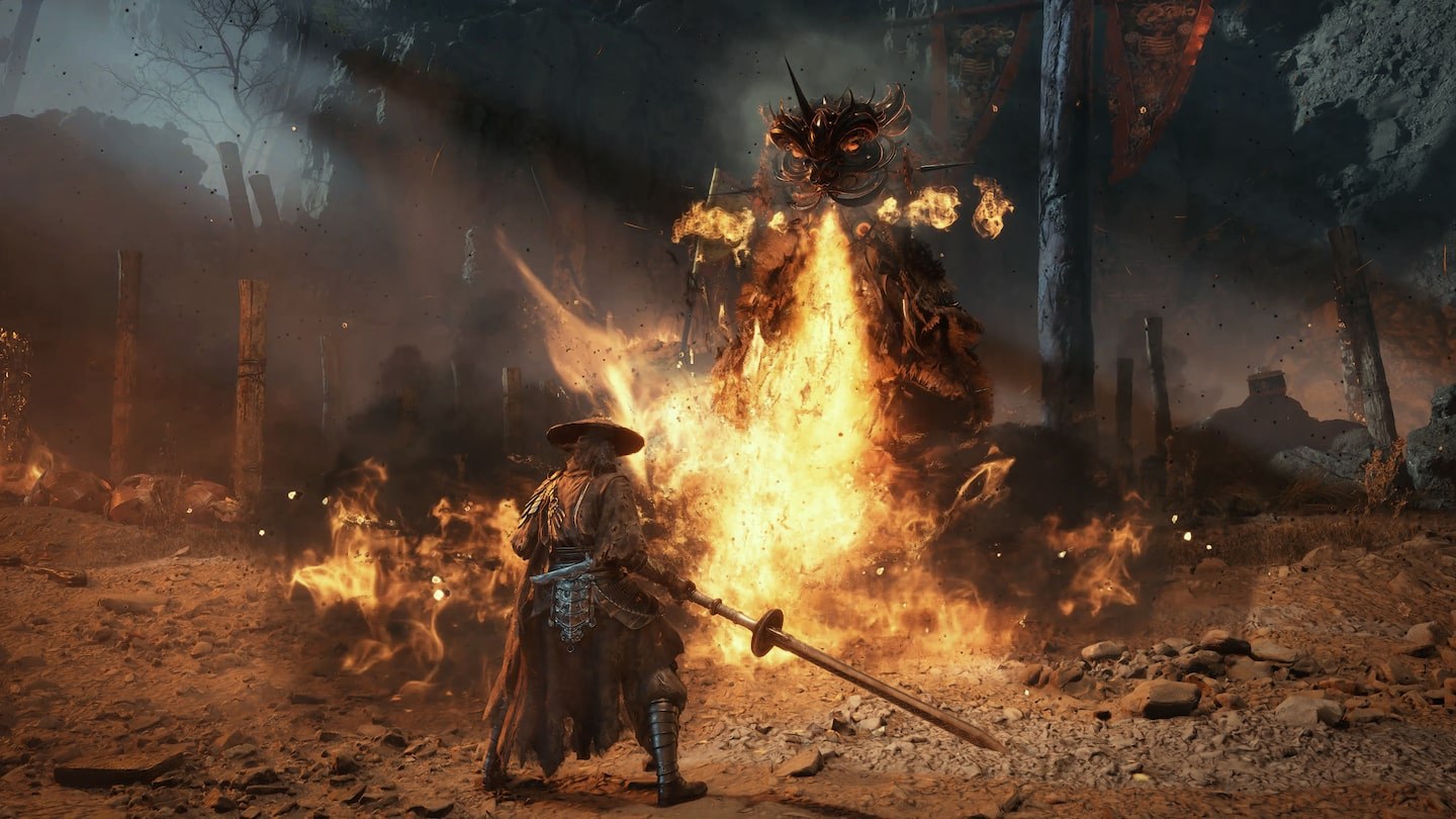 Phantom Blade Zero: Soul faces a giant burning enemy in a ruined village