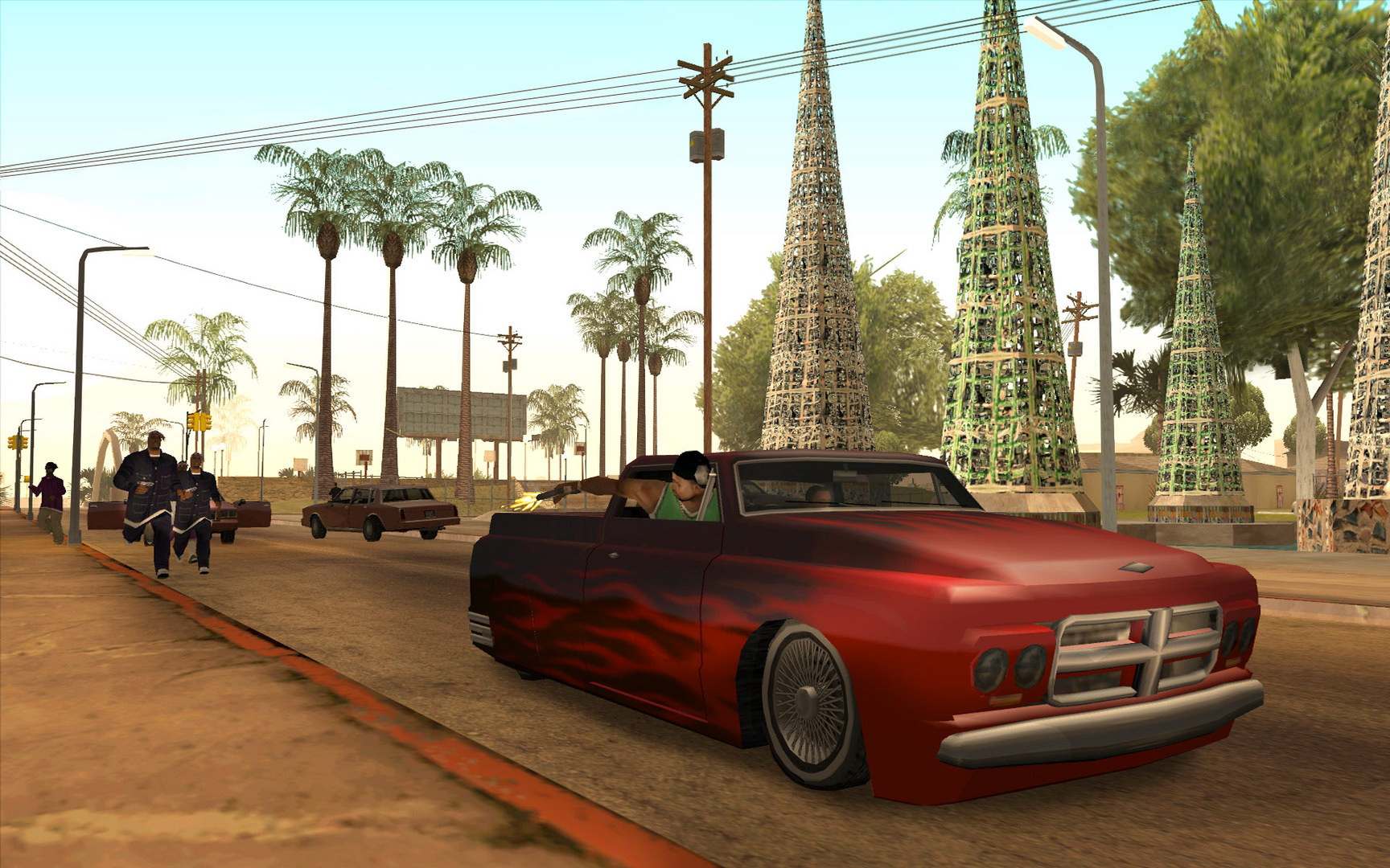 A red lowrider with flame paint parked on a Los Santos street