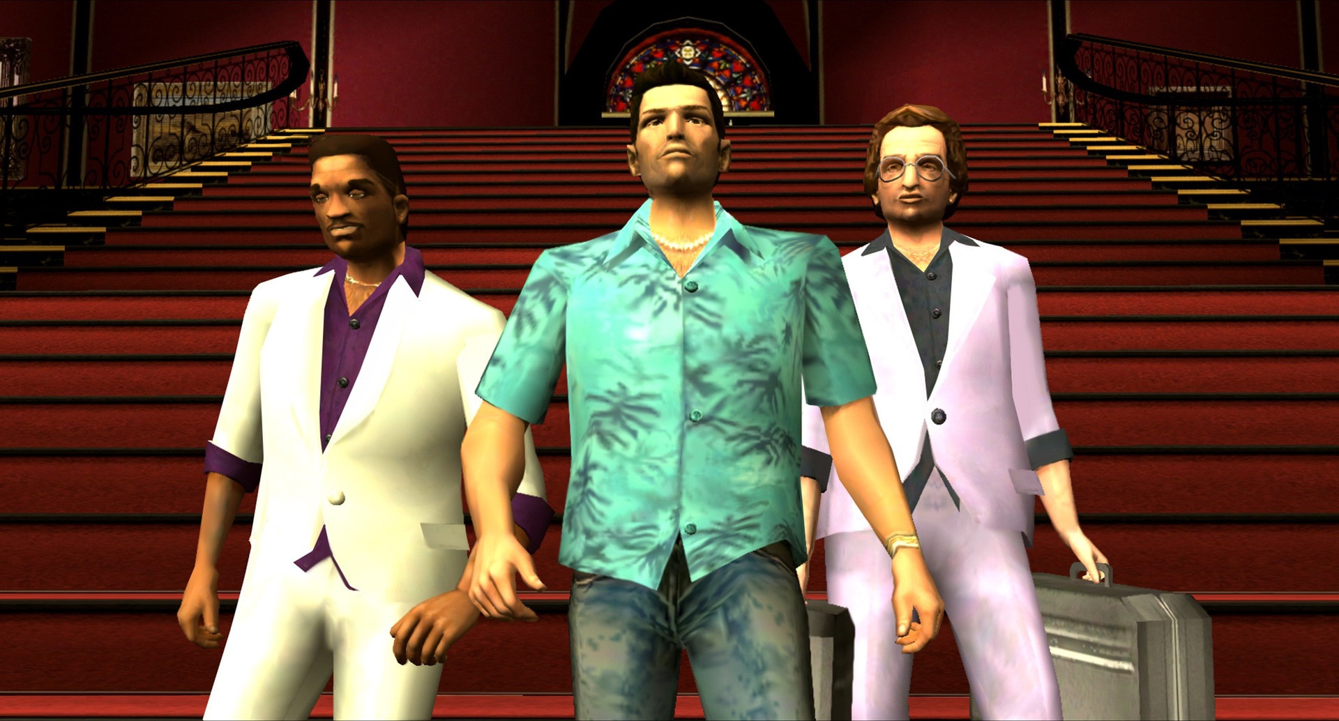 Tommy Vercetti flanked by two associates in white suits on red carpeted stairs