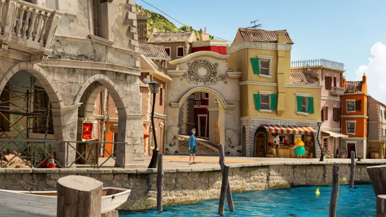 Sunny canal harbour in Verice Bay with colourful Italian style houses